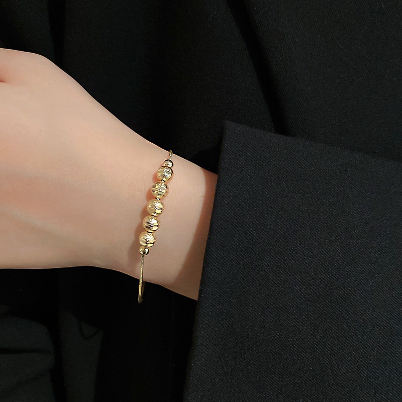 Vòng tay titan nữ không gỉ mạ vàng 18k thiết kế dạng viên bi thời trang thanh lịch 2023
