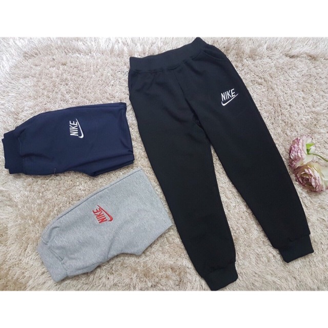 Quần nỉ da cá Nike 8-14y