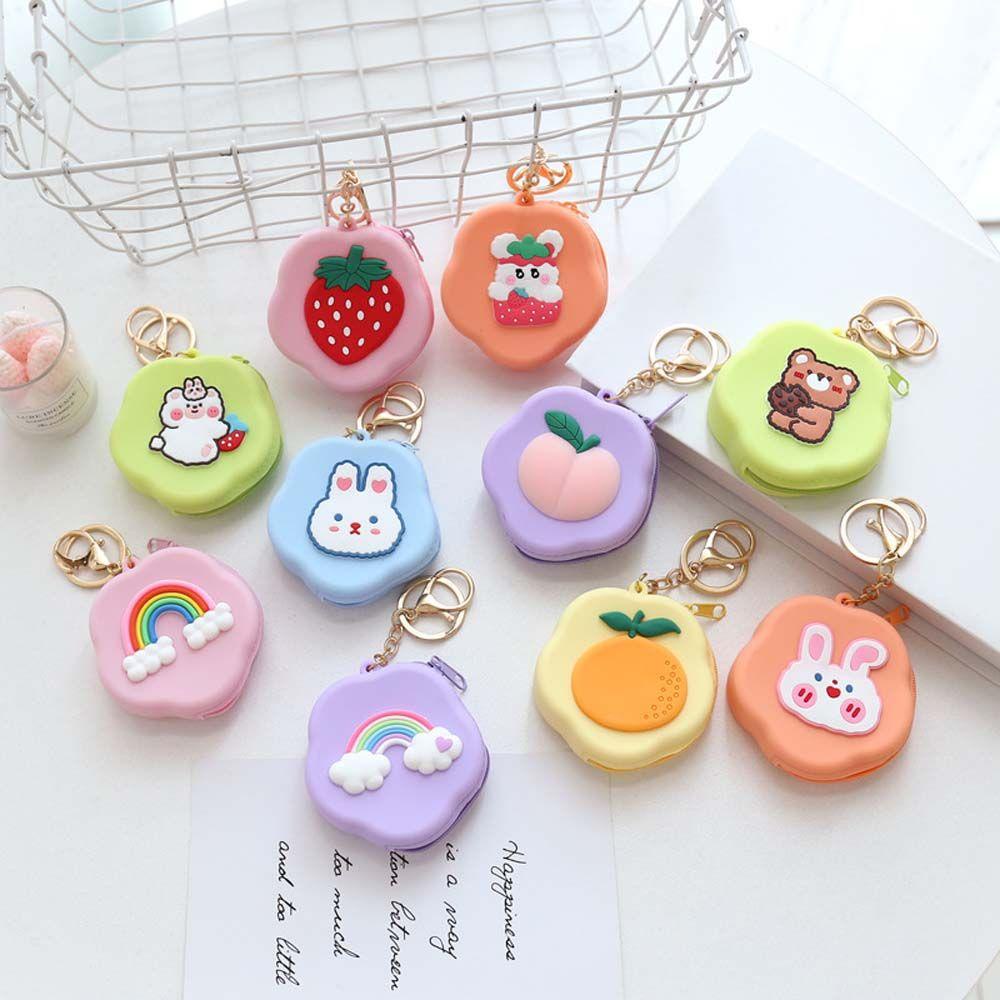 Ví Đựng Tiền Xu Mini Bằng Silicon Họa Tiết Hoa Lấp Lánh Kèm Móc Khóa Kéo Tiện Dụng Ốp