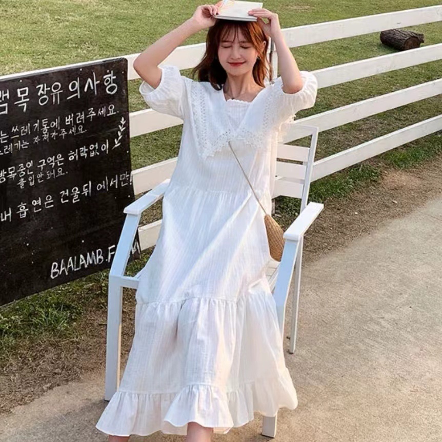 Đầm dáng rộng màu trắng dài hơn đầu gối thời trang cho nữ