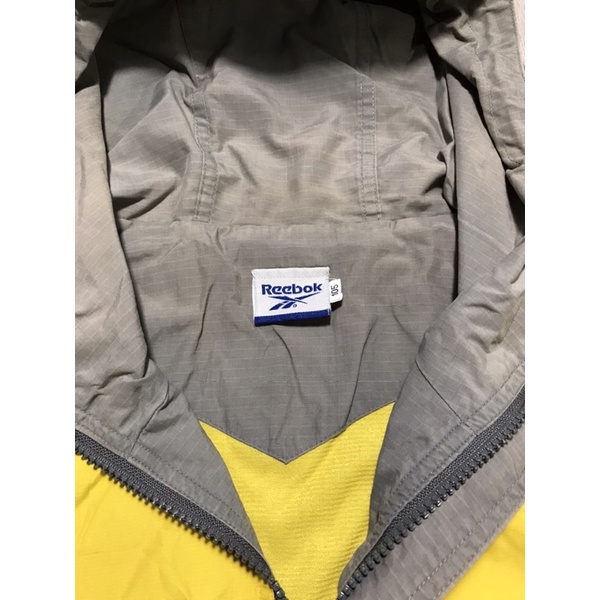 Áo khoác thể thao Nam hiệu Reebok màu vàng size XL