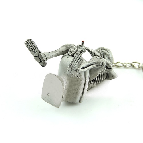 Móc chìa khóa hình bộ xương ngồi toilet độc đáo sáng tạo