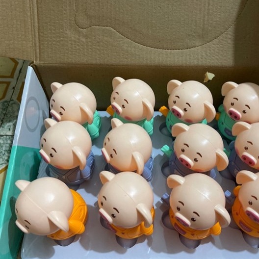 Đồ chơi trẻ em thú nhảy dây cót, lợn dây cót