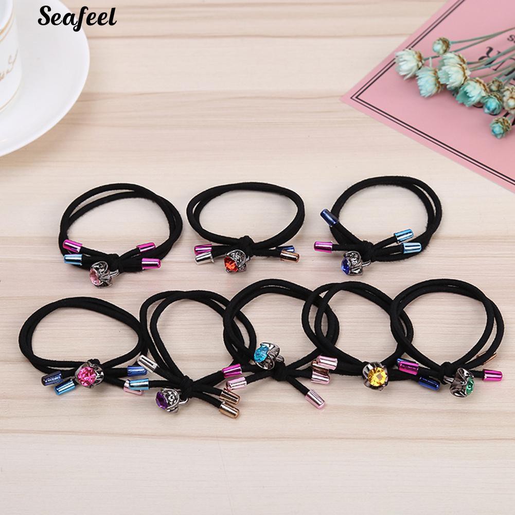 Thun cột tóc đính đá.