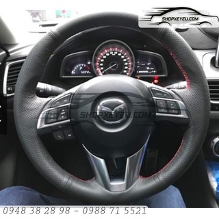 Da bọc vô lăng mazda đời facelift