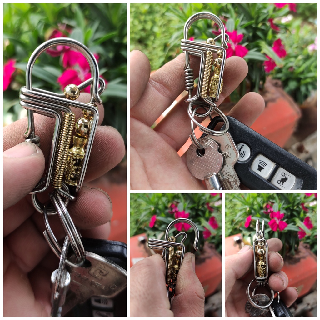 Móc khóa thủ công gắn lục bình inox, đồng