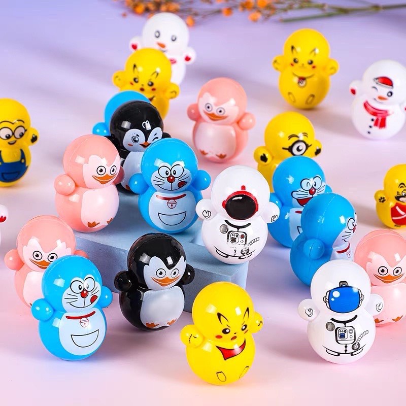 Lật đật mini đồ chơi dễ thương squid game, doremon, minion,pikachu,ông già noel, thần tài, chim cánh cụt