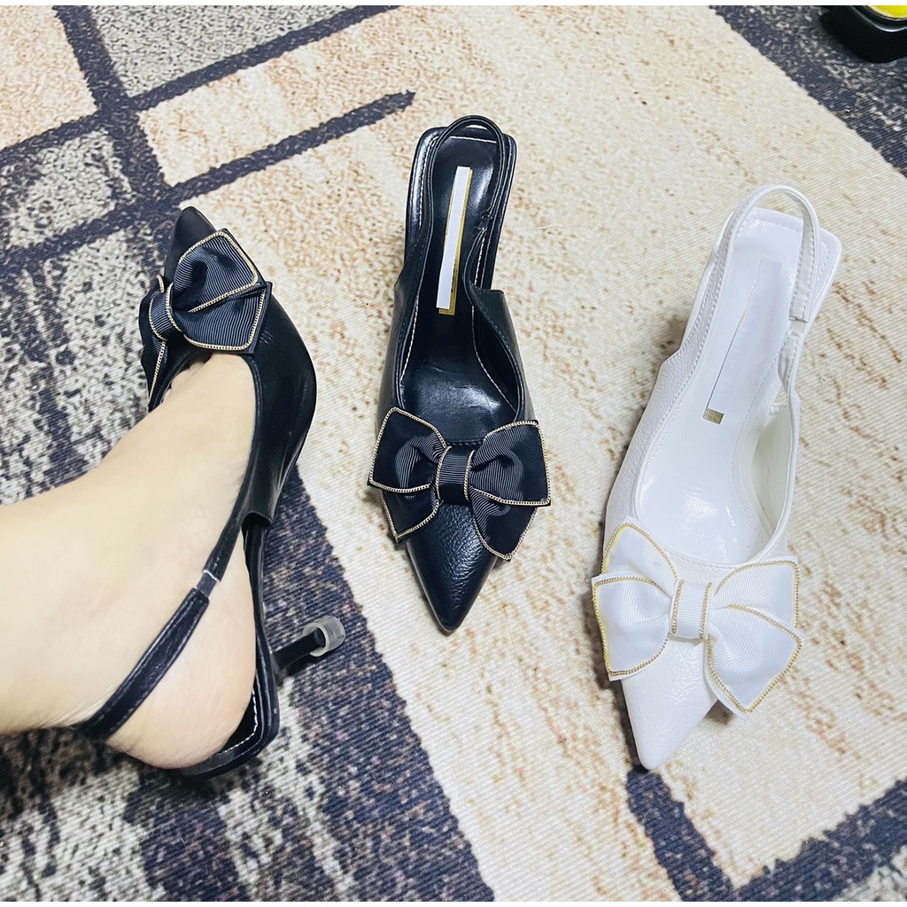 Sandal bít mũi da mịn nơ vải viền xích nhỏ gót đũa - 7P