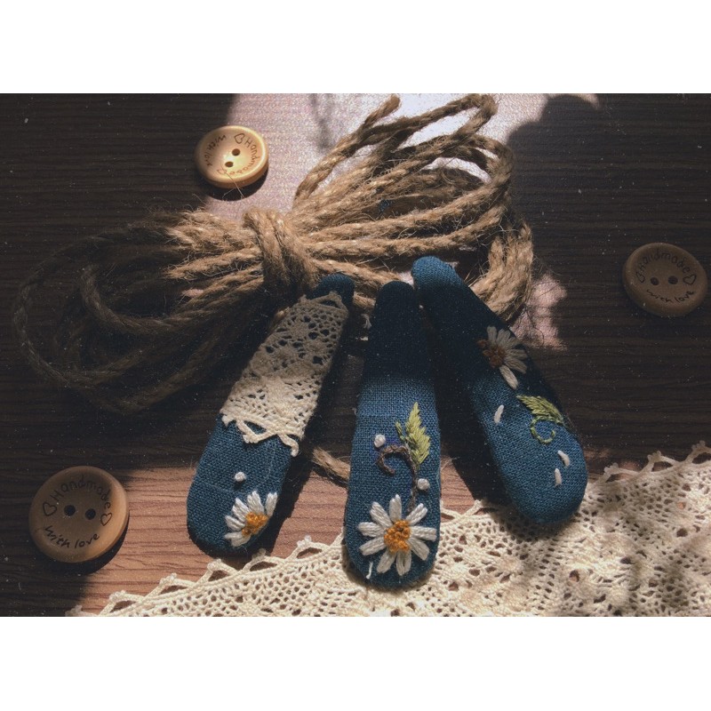Kẹp cúc hoạ mi handmade