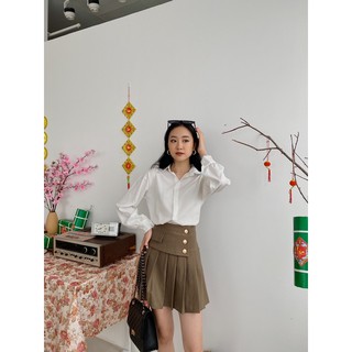 Chân váy xếp ly khuy dạ