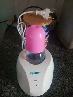 Sỉ máy hâm sữa, ủ sữa yummi kèm bình sữa