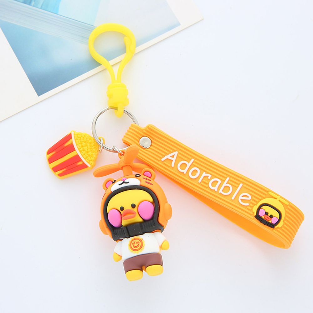 Móc khóa hình vịt con đội nón bảo hiểm xinh xắn