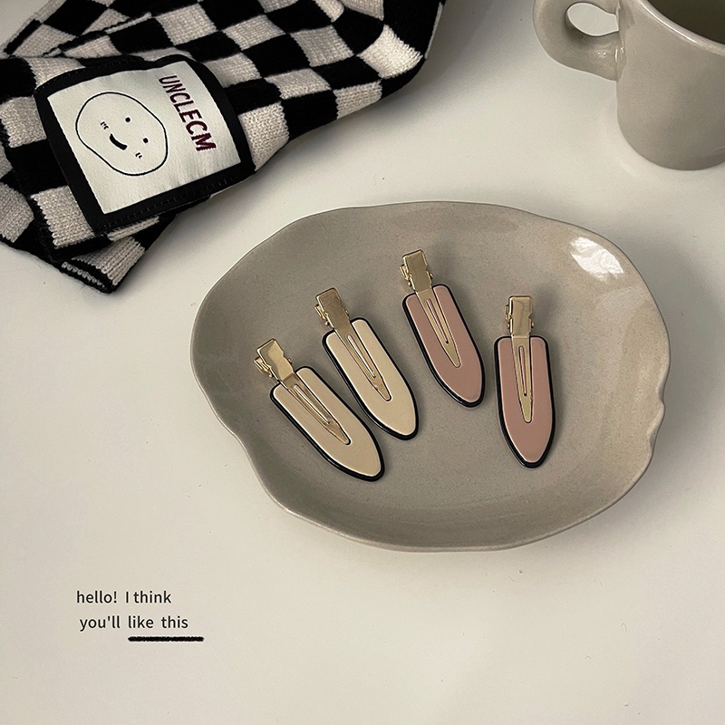 Kẹp tóc phong cách retro thời trang cho nữ