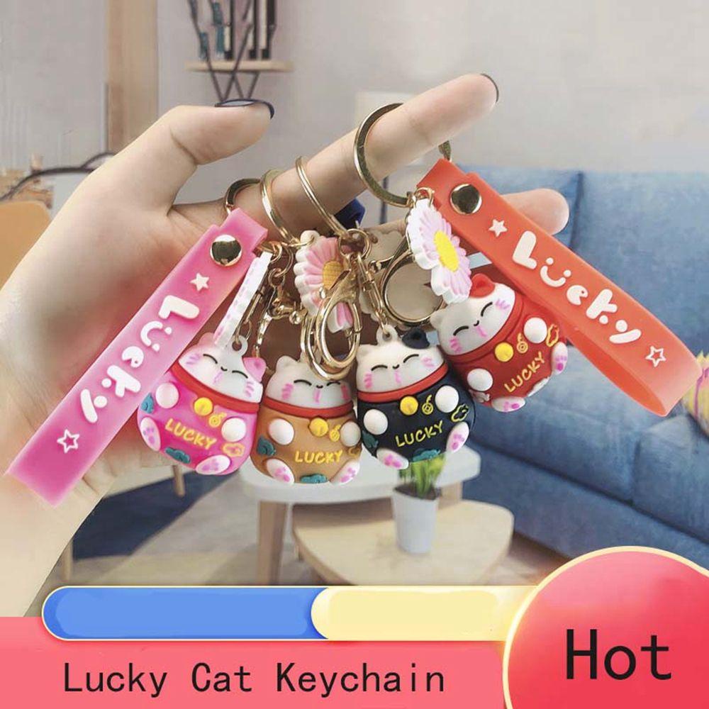 Móc Khóa Hình Chú Mèo May Mắn Và Hoa Cúc Đỏ Dễ Thương