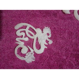 Chữ thư pháp đầu rồng dán dừa, dưa, bưởi chưng tết