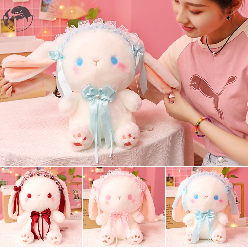 Thỏ nhồi bông mềm mại trang trí phòng cho bé