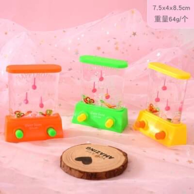 Đồ chơi bấm nước bắn vòng,đồ chơi trẻ em