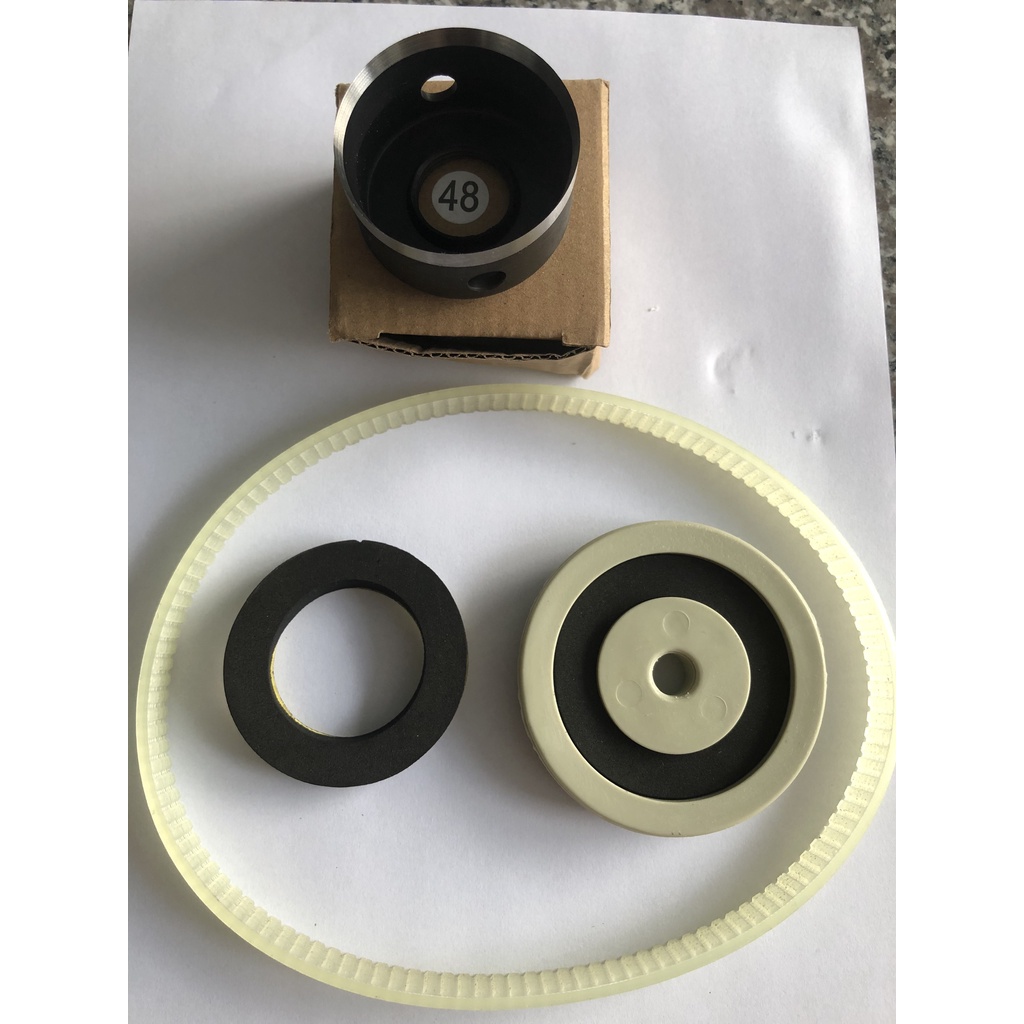 phụ kiện miếng đệm xốp, lưỡi dao 48mm, dây curoa và nắp dập của máy đục lỗ rèm(máy oze)