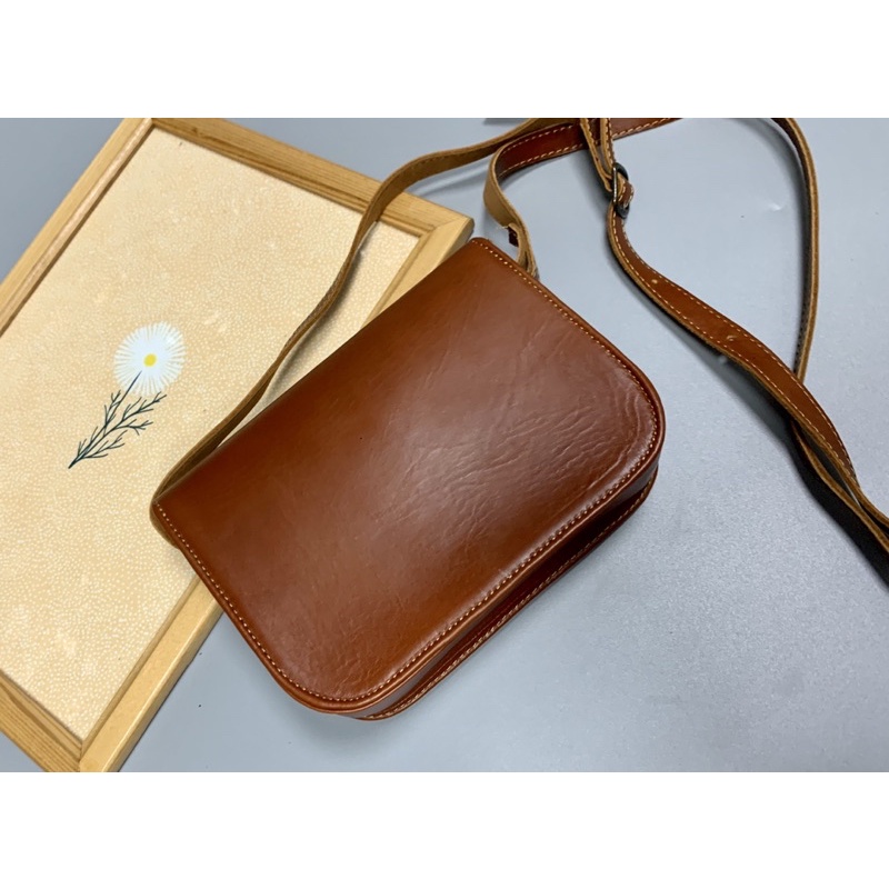 Túi đeo chéo da bò