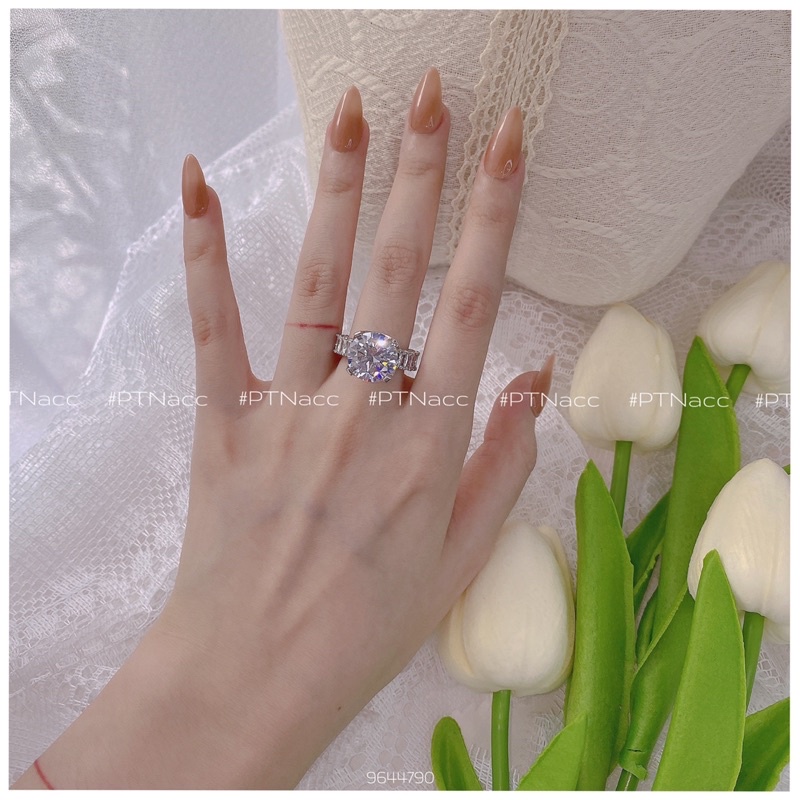 Nhẫn xi bạch kim 4 chấu hột chủ to 9li siêu sáng .PTNACC.
