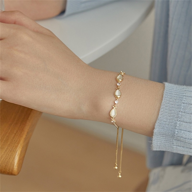 Vòng tay mặt hình cá nhỏ đính đá Opal có thể điều chỉnh cho nữ