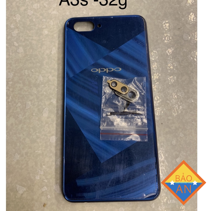 lưng oppo A3S - 32g ( lỗ tróc sim trên ) gồm lưng ,kính cam ,nút bấn