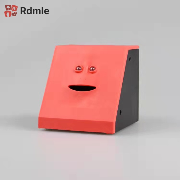 Đồ Chơi Tiết Kiệm Tiền Xu Hình Khuôn Mặt Vui Nhộn