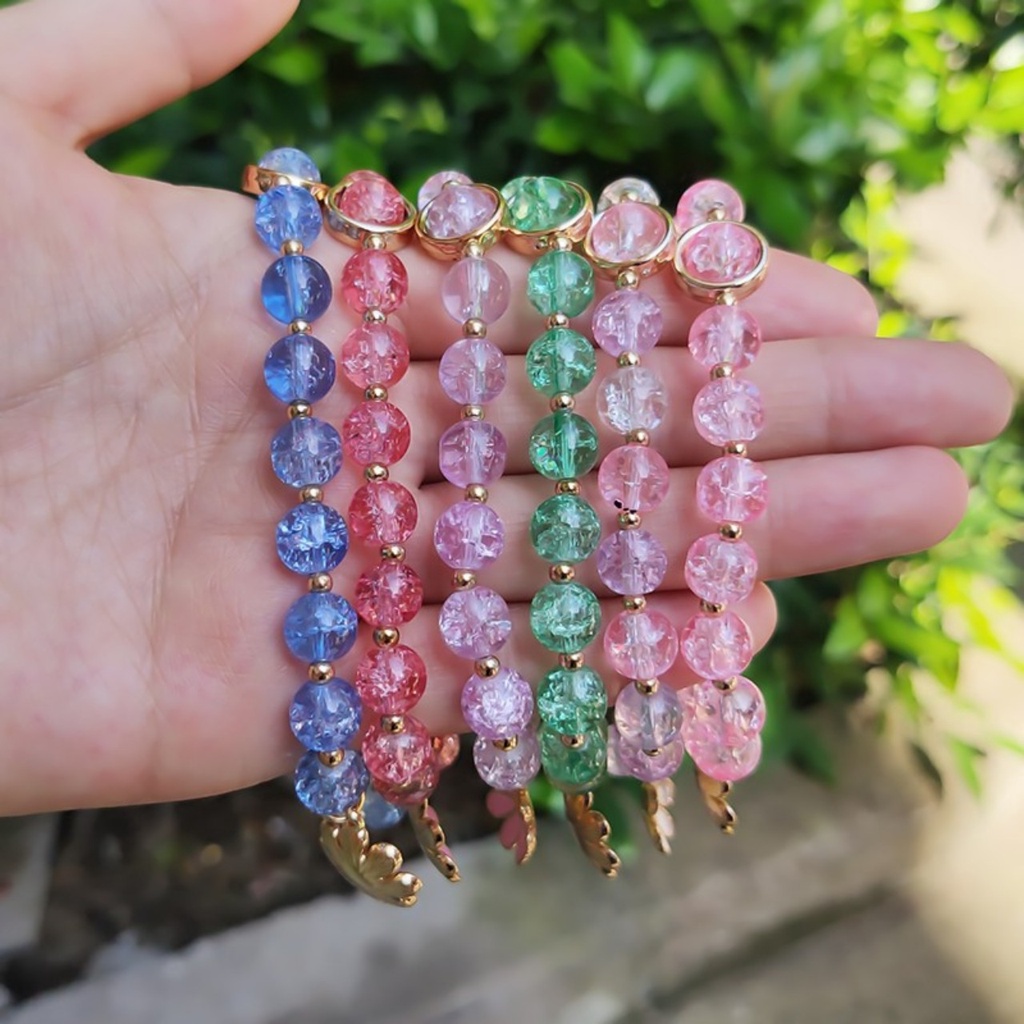 Vòng tay tua rua hoa cúc xỏ hạt pha lê phong cách Hàn Quốc