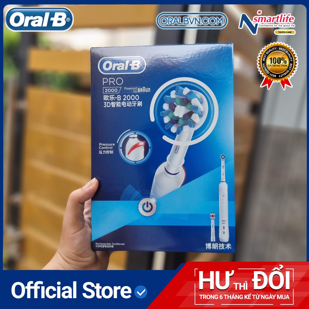 Bàn chải đánh răng điện tự động Oral B Pro 2000 trắng làm sạch răng, hạn chế viêm nướu