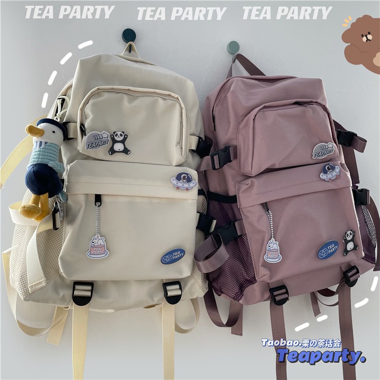 Cặp đi học, cặp đi học unisex nam nữ 4 nịt bên hong. Tặng kèm bộ pin cài như hình.