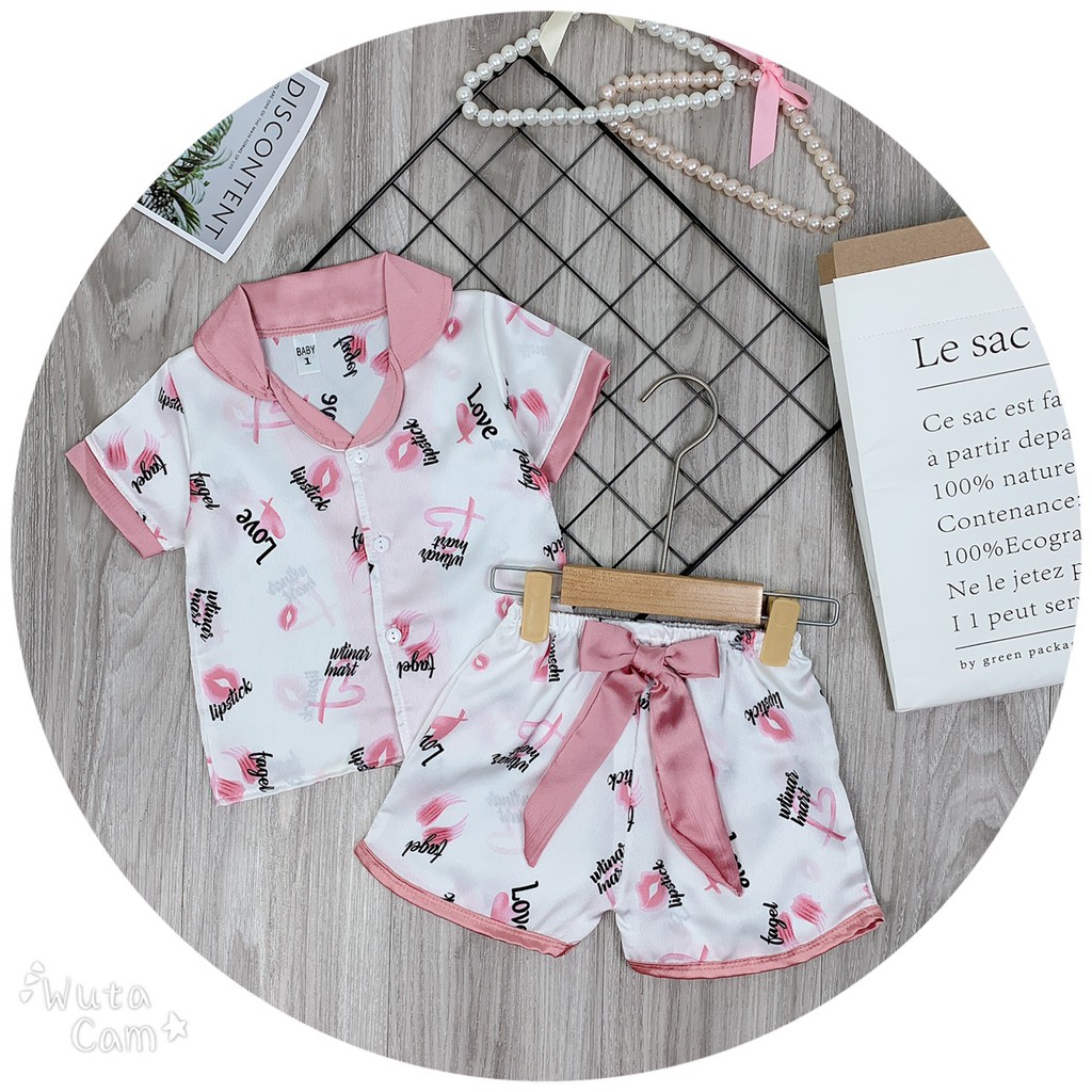 Bộ pijama lụa nơ nhiều hình bé gái