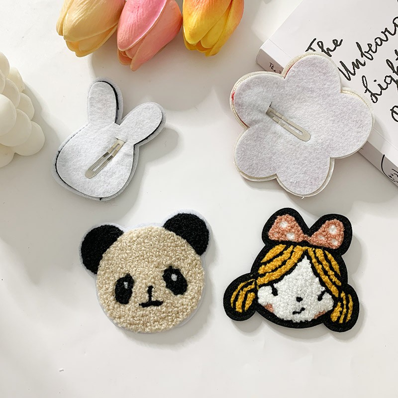 Kẹp tóc hình hoạt họa dành cho bé gái