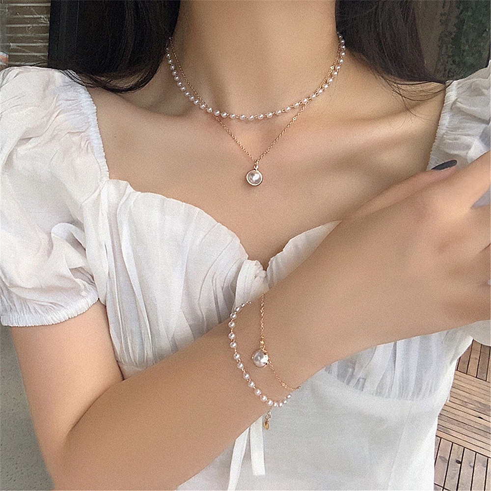 Vòng cổ choker hai lớp đính hạt ngọc trai thời trang mùa hè 2021 phong cách retro dành cho nữ