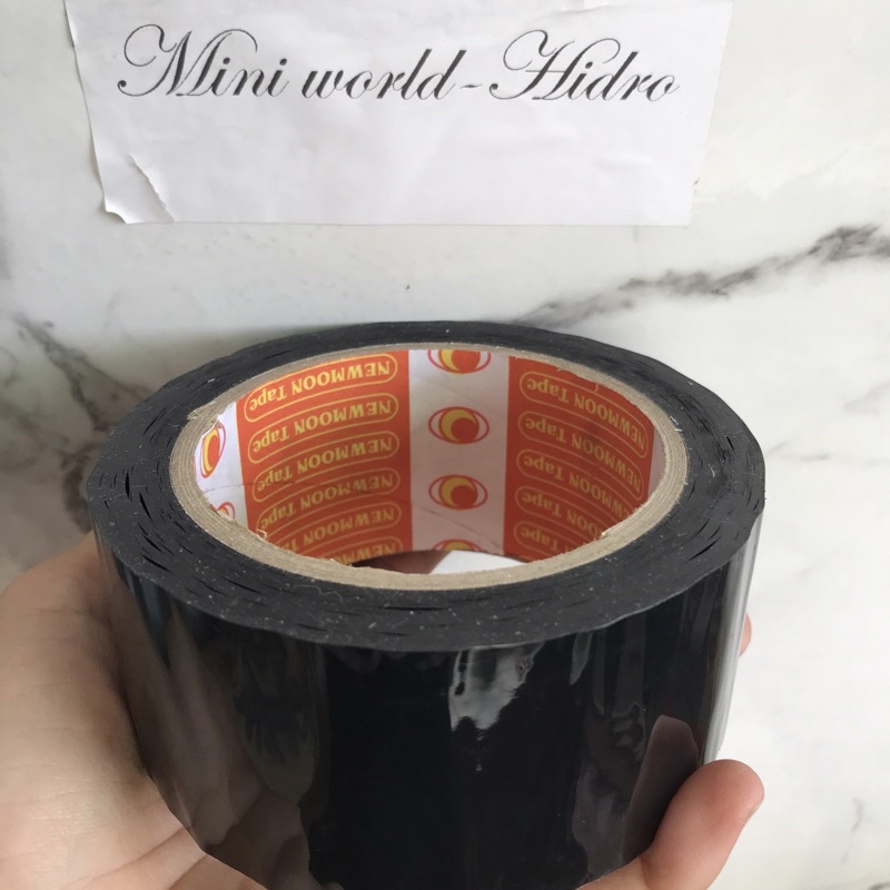 Băng keo trong dán hàng loại 1, keo dày, lõi giấy mỏng dễ bể vỡ màu đen