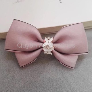 Kẹp búi nơ hồng đính đá phối ren
