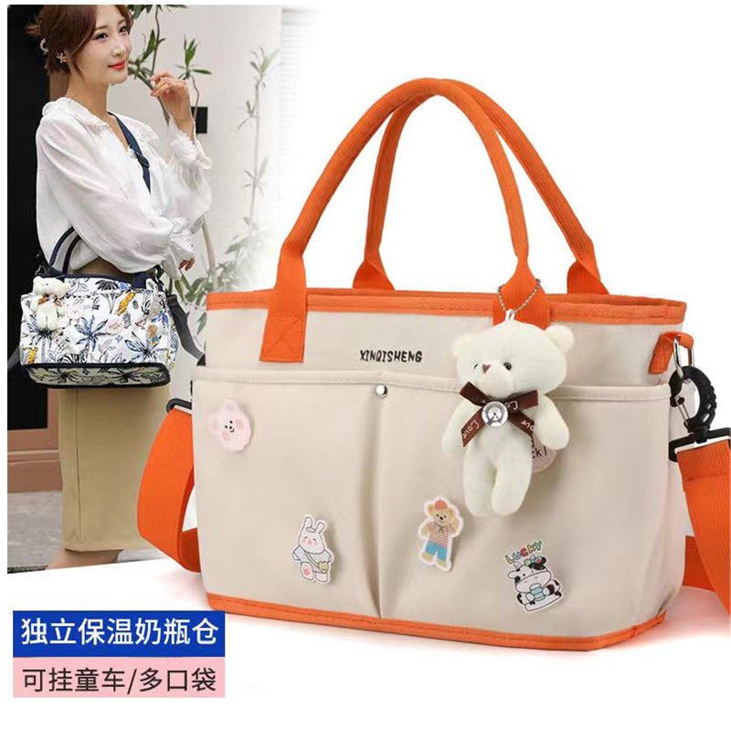 Túi vải Canvas đeo vai đựng đồ gắn xe đẩy em bé tiện dụng