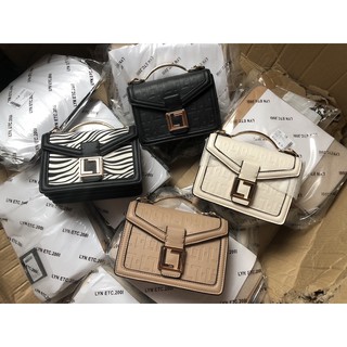 Túi lyn cặp tay cầm kim loại