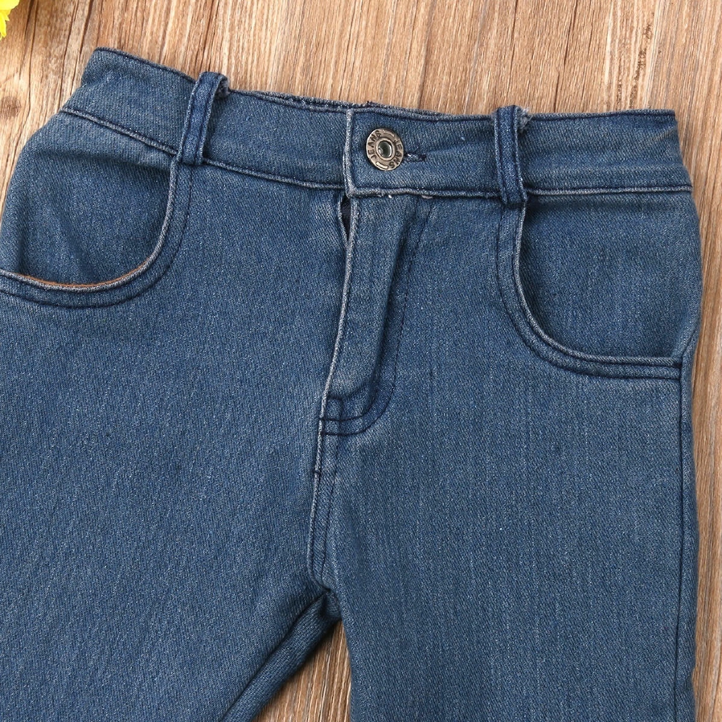 Quần jeans ống loe thiết kế rách lai độc đáo cho bé gái