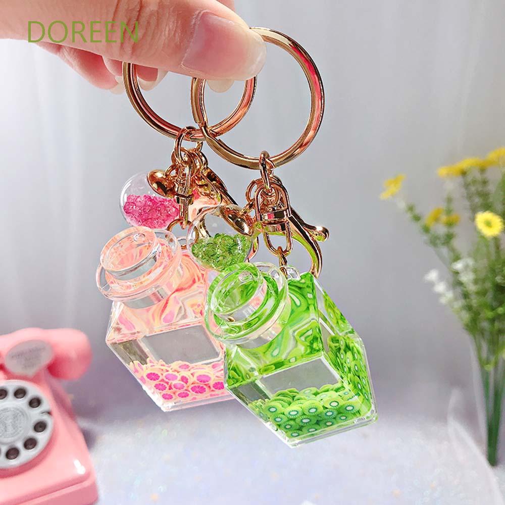 Móc Khóa Hình Chai Nước Kim Tuyến Lấp Lánh