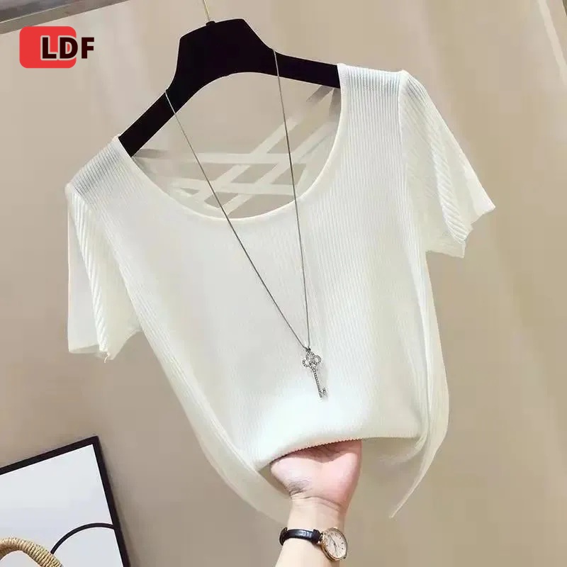 Áo Croptop Đan Len Dáng Rộng Hở Lưng Thời Trang Cho Nữ