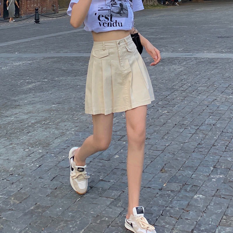 Chân váy tenis chất liệu kaki cúc giữa trẻ trung | BigBuy360 - bigbuy360.vn