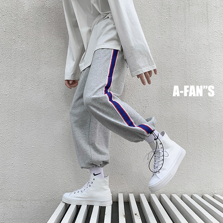 Casual pants Drawstring trousers Hip-hop trousers running track pants Contrasting striped loose straight-leg pants for men and women Korean style trendy nine-point guard pants Wild INS Hong Kong fashion brand pants in stock