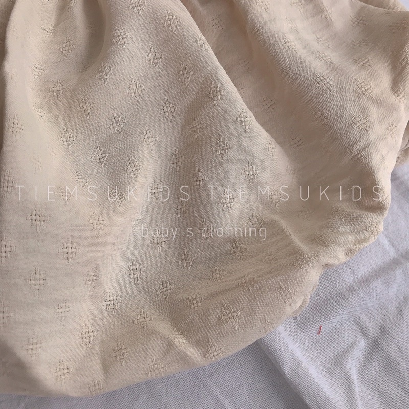 HÀNG THIẾT KẾ - Bộ đồ liền thân cài đũng nhún ngực tay vai bồng màu be kèm tuban cho bé