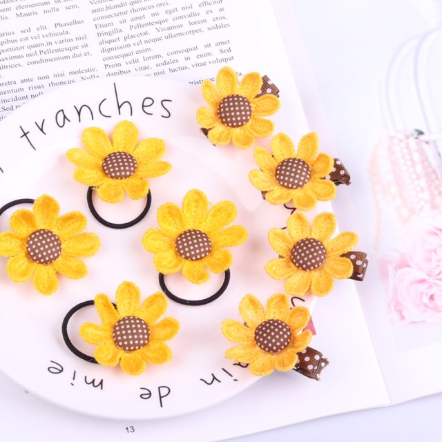 Sỉ 10 buộc tóc hình hoa len đan 53k