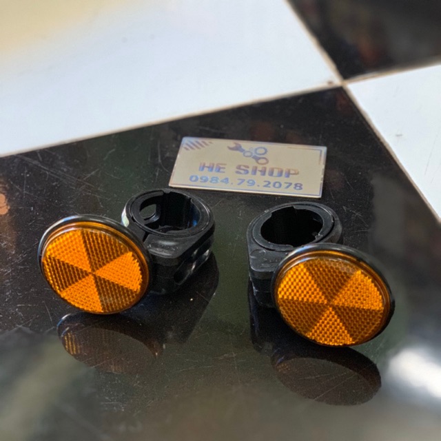 Mắt mèo phản quang TLR (Pát vòng kẹp phuộc trước)