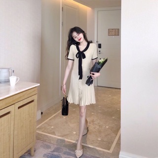 Váy len mongtoghi cổ nơ cúc ngọc
