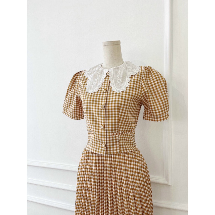 Set đồ nữ công sở áo tay phồng cổ ren kết hợp chân váy midi xếp ly caro NPSET010