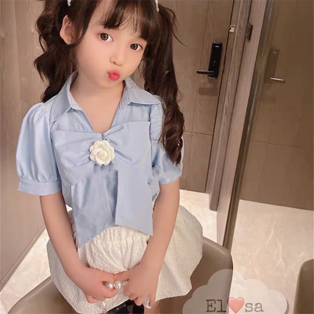 Set áo tay phồng kèm bông hoa + chân váy trắng phong cách HOTRENDS  annakids