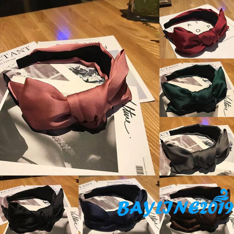 Cài tóc đính nơ thanh lịch cho nữ