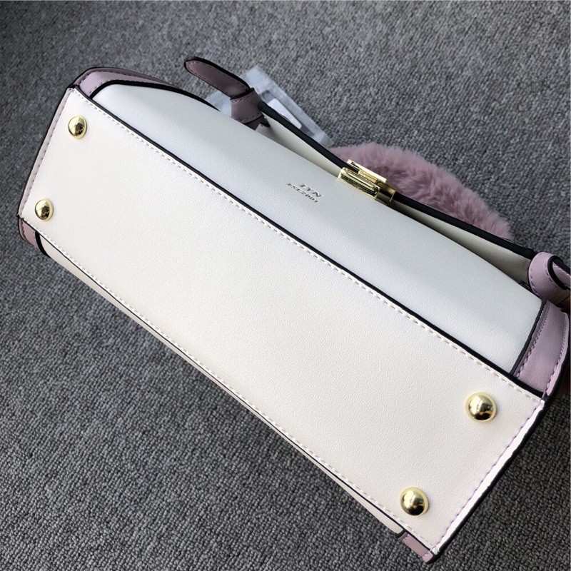 Túi lyn tay cầm lông